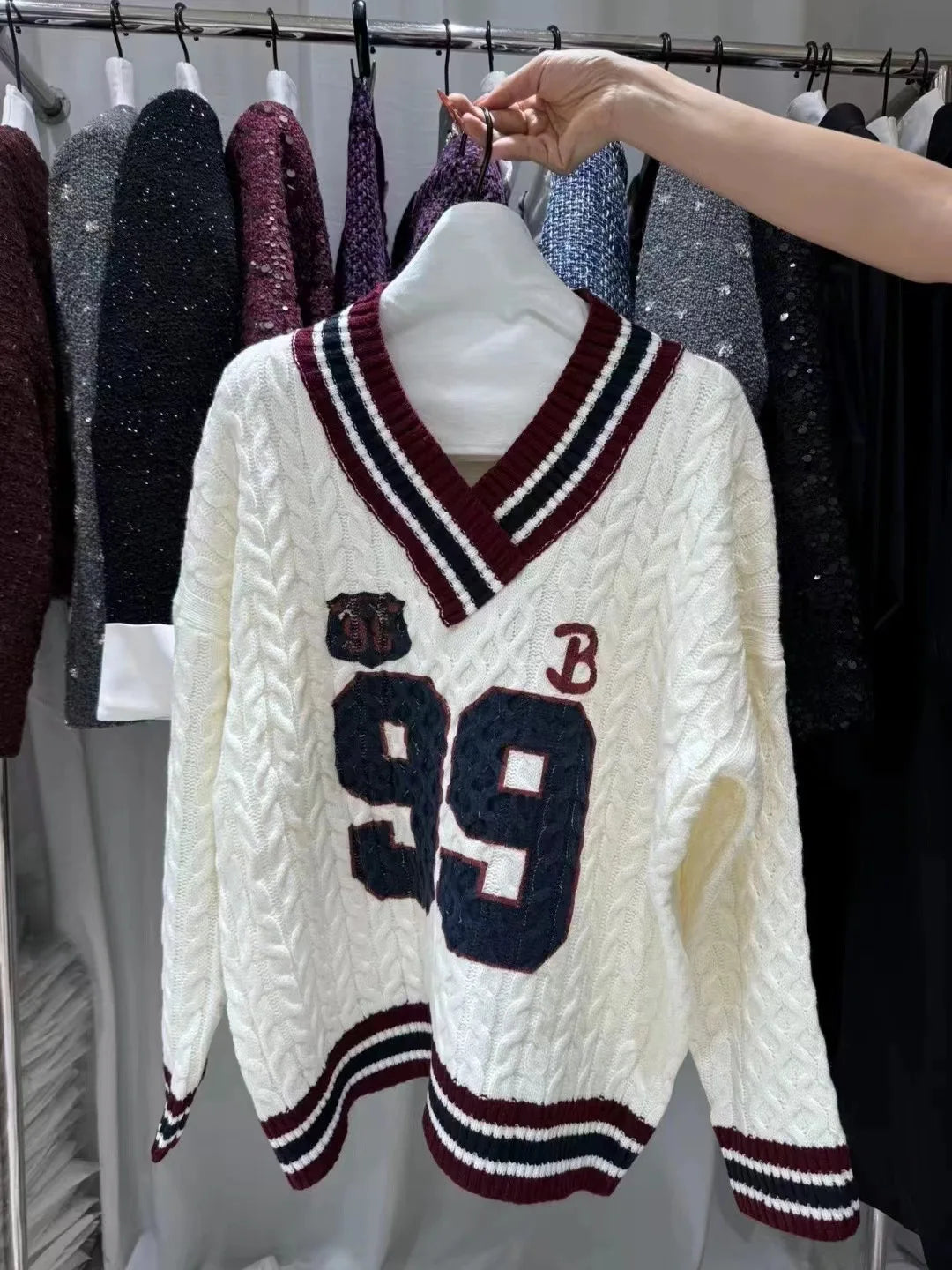 '99' Stripped Neck Cable Knit Sweater
