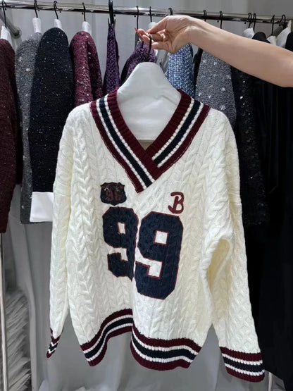 '99' Stripped Neck Cable Knit Sweater