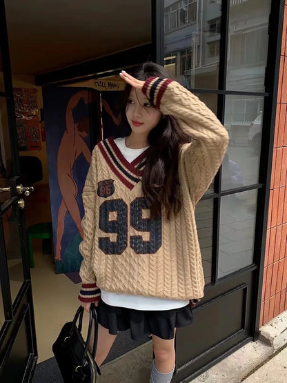 '99' Stripped Neck Cable Knit Sweater