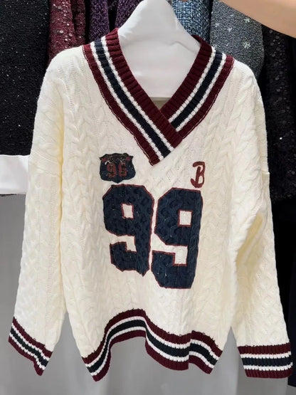 '99' Stripped Neck Cable Knit Sweater
