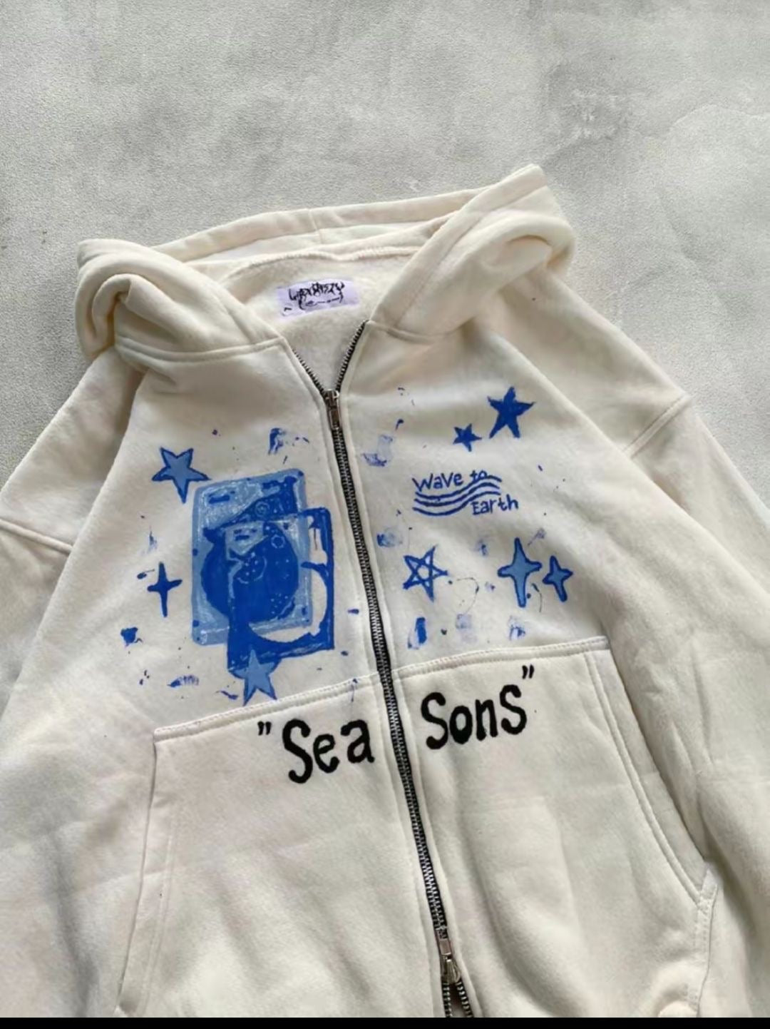 White “SeaSons” Zip-Up Hoodie