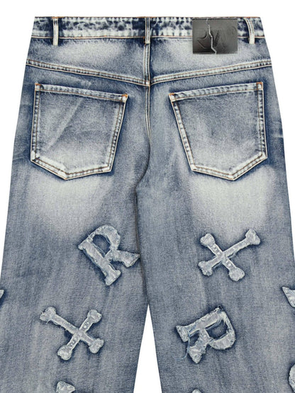 Frayed Cross & Letter Patch Jeans